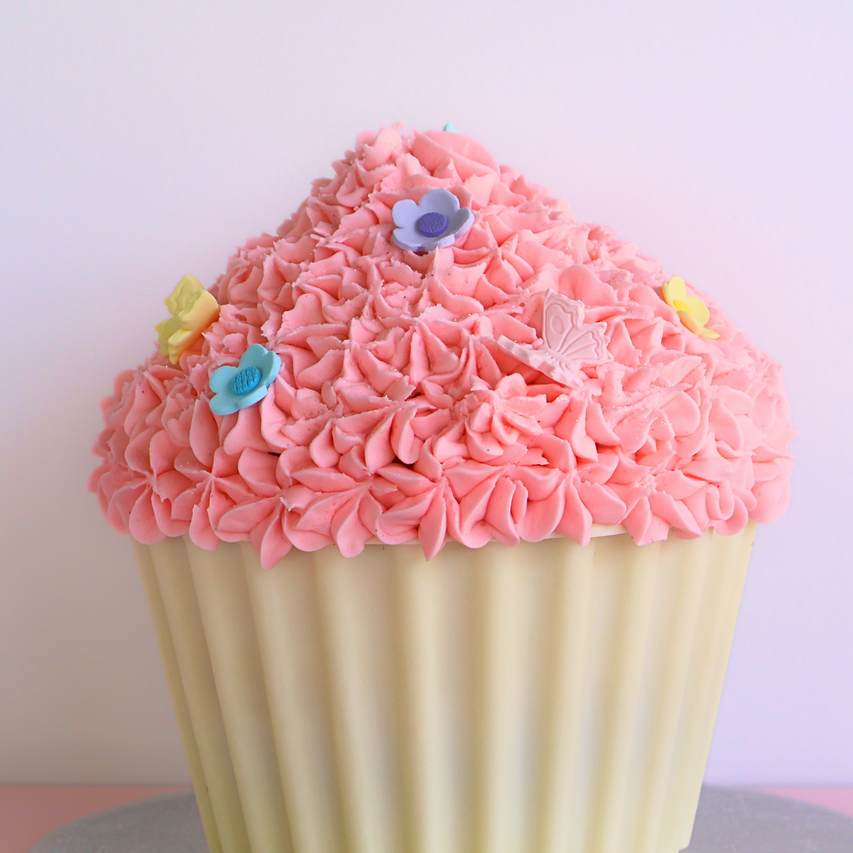 Pink Vanilla Giant Cupcake Cake with Butterflies and Blossom Flowers - The Cupcake Queens