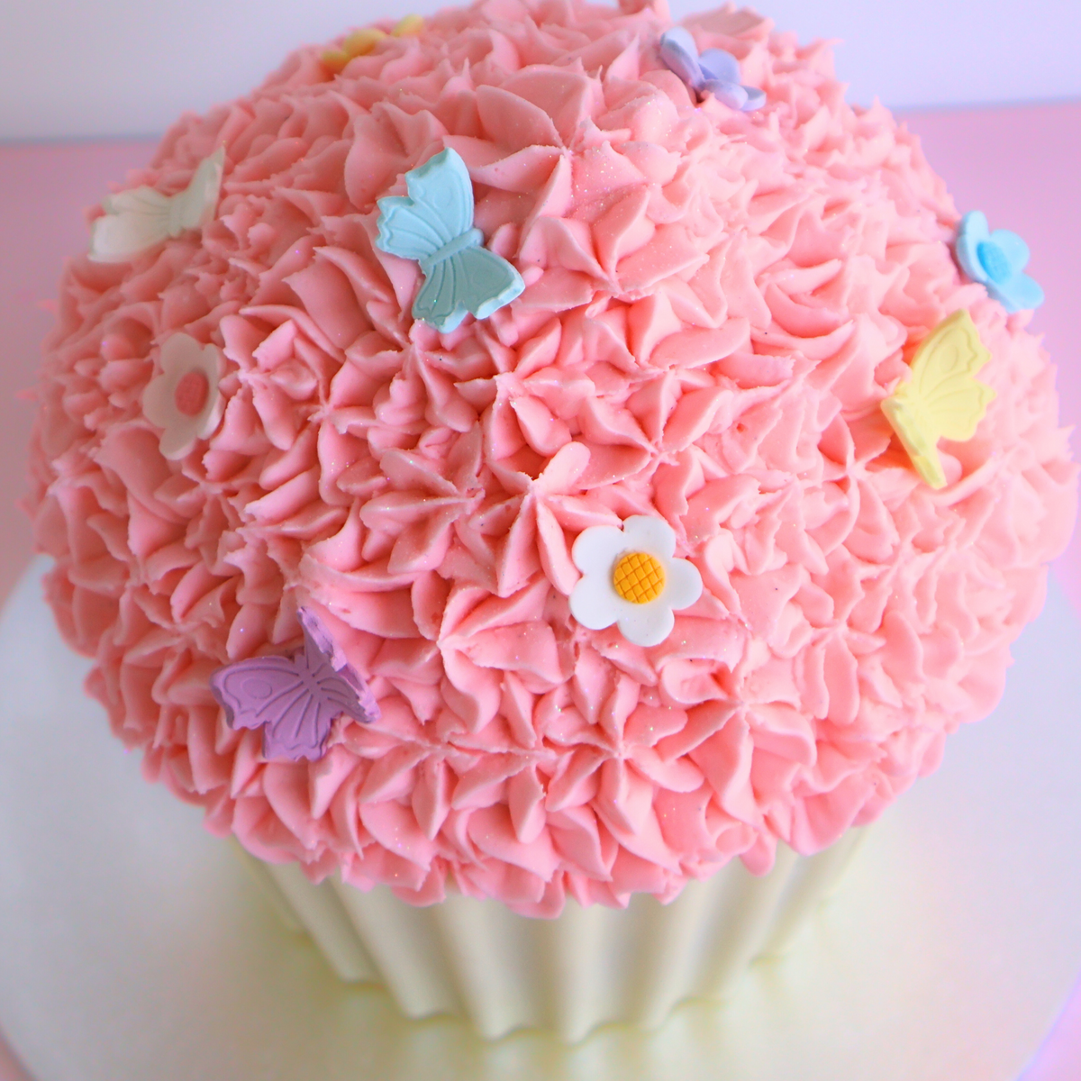 Pink Vanilla Giant Cupcake Cake with Butterflies and Blossom Flowers - The Cupcake Queens